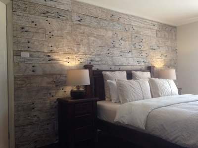 Simply Wood Wall Whitewashed and Wire brushed sleeper on black backing board - Sydney